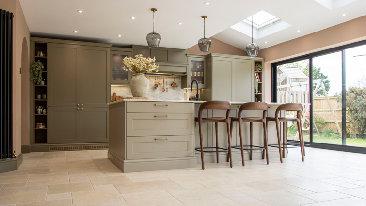 A Mediterranean kitchen in pastel greens with Mediterranean kitchen tiles
