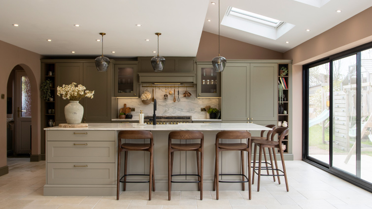 A Mediterranean kitchen in pastel greens with Mediterranean kitchen tiles