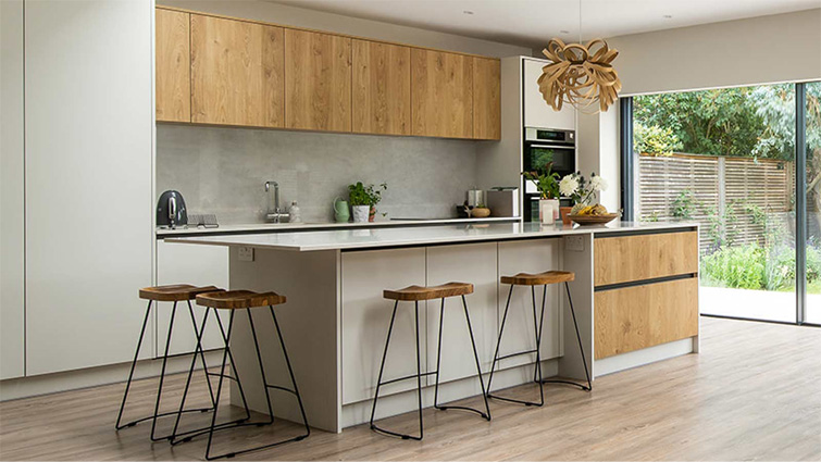 Modern minimalism shown in a modern kitchenette with a light kitchen island