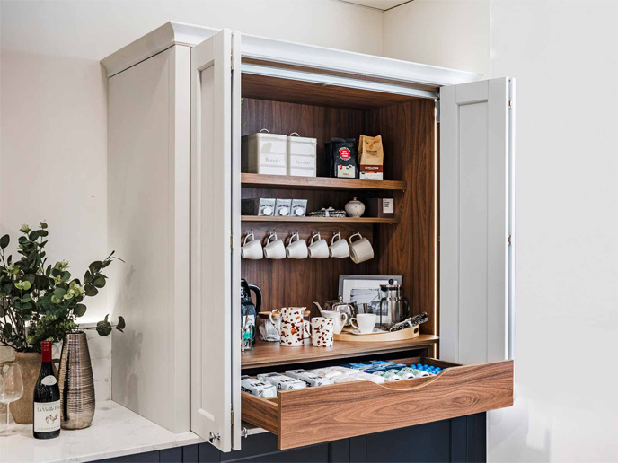 A modern wooden kitchen cabinet with simple kitchen storage solutions