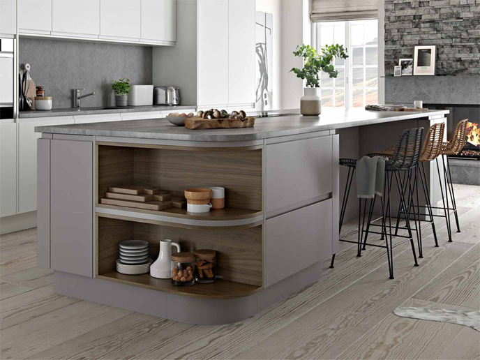 A decluttered kitchen counter with grey minimalist kitchen cabinets and a calm kitchen feel