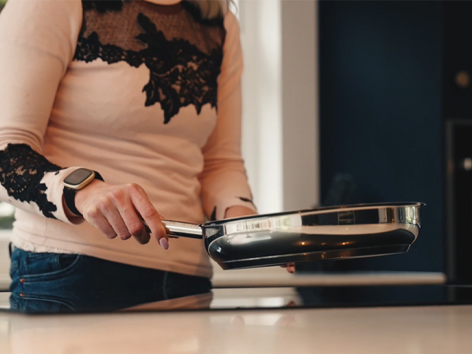 A mum cooking in her family kitchen