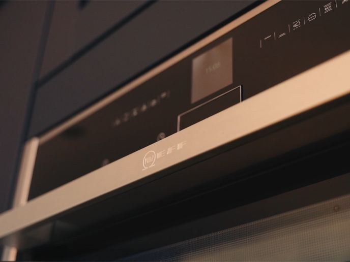 A Neff combination microwave oven slide and hide closeup