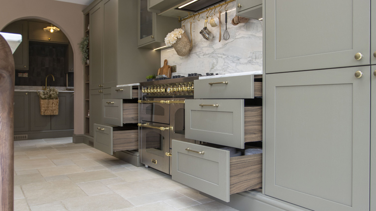 Mushroom kitchen walls with a green and dark wood cabinetry