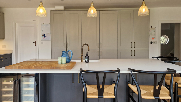 A mushroom kitchen with a blue kitchen island