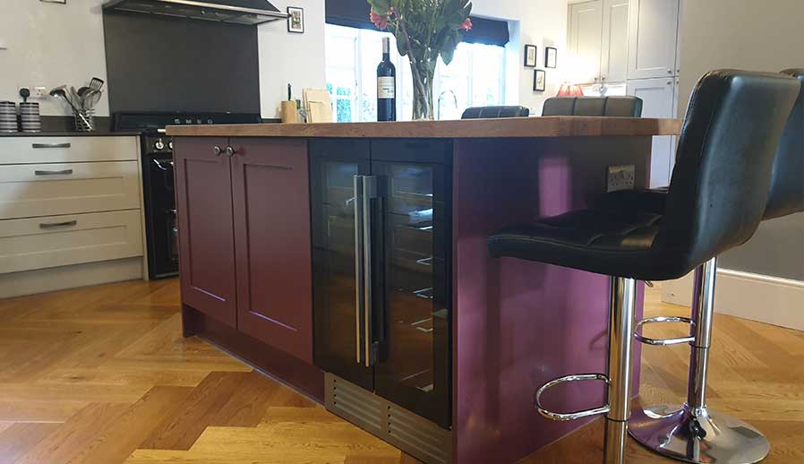 Shaker kitchen island in purple with wine storage