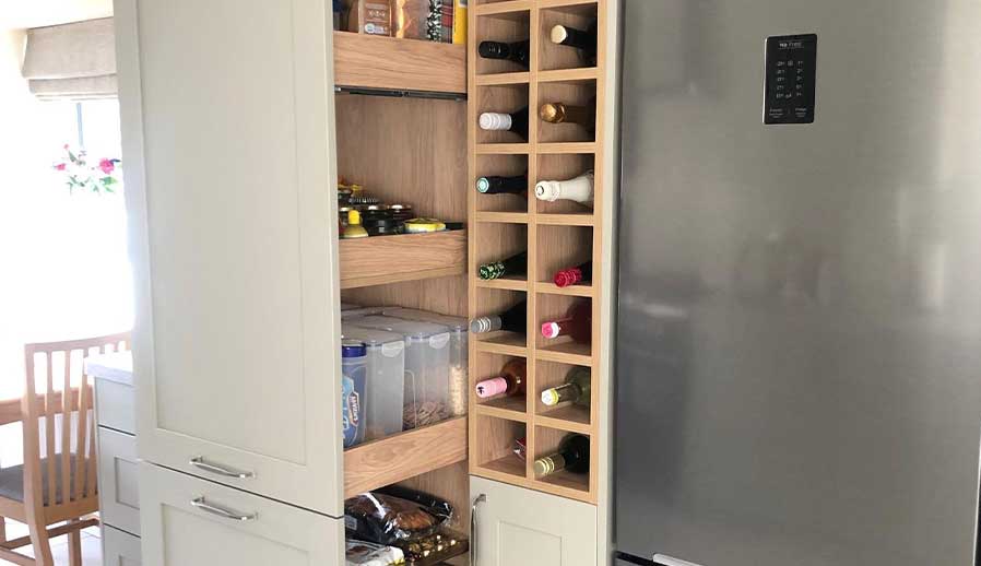 Shaker kitchen with pull out storage in Cardiff
