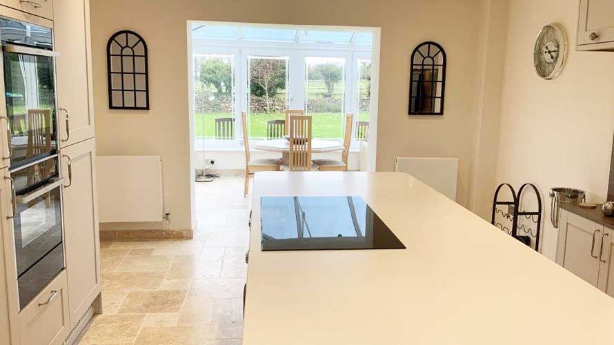 Wall mirrors in a grey shaker kitchen