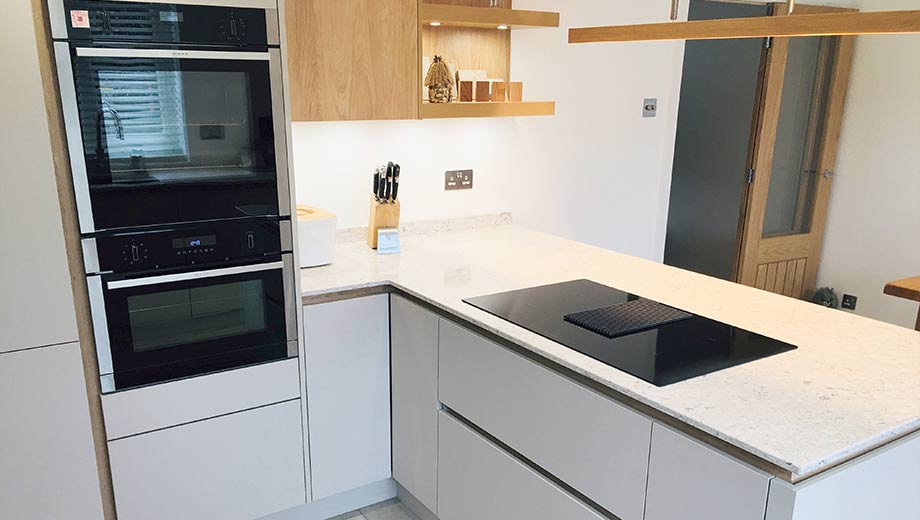 Small kitchen with handleless cabinet doors