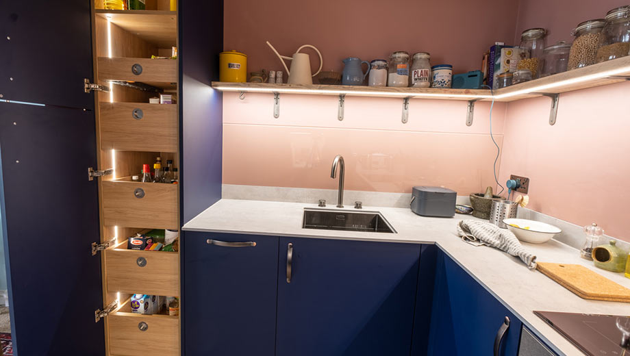 Small kitchen featuring larder unit