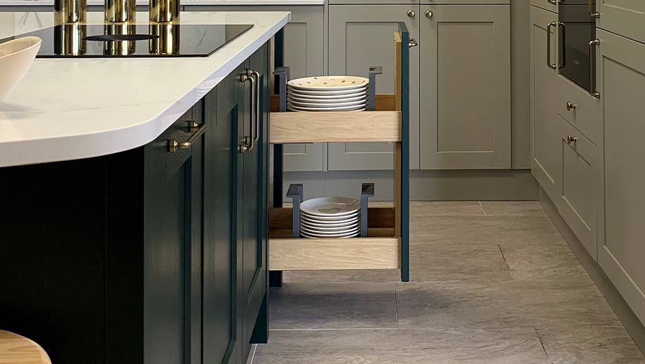 Kitchen island with pull-out larder storage