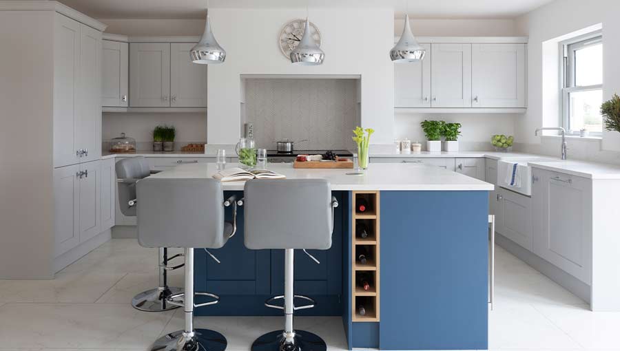 Blue kitchen island in a contemporary shaker kitchen