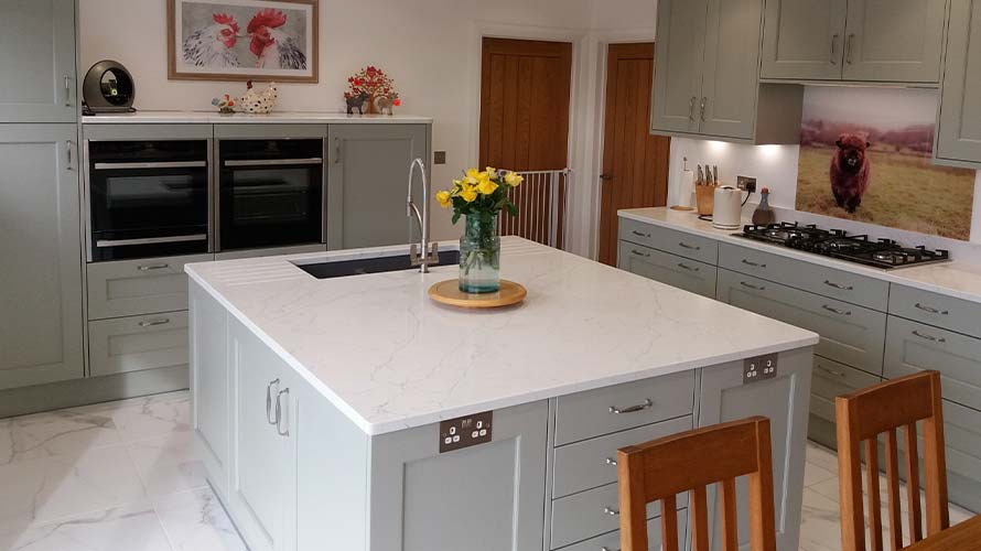 Traditional kitchen with grey kitchen island in Cardiff