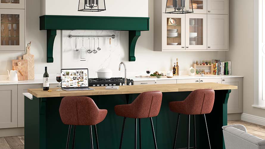 Green shaker kitchen with traditional mantle