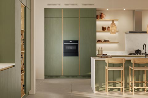 Oxwich - Painted wood handleless kitchen.