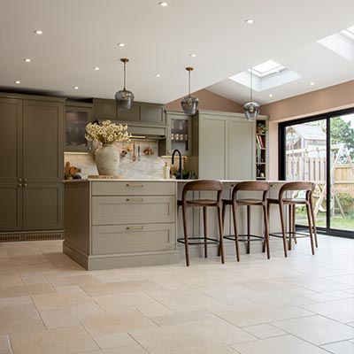 A green shaker kitchen designed by Sigma 3